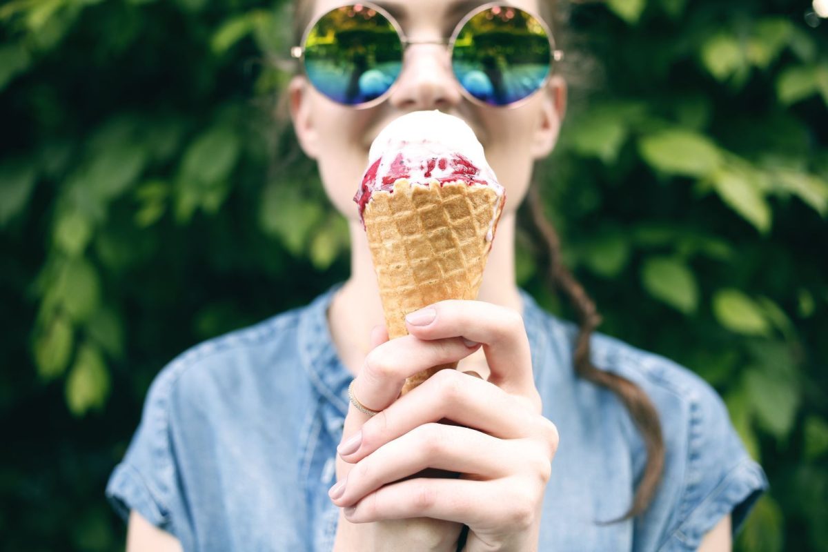 women enjoying an ice cream cone