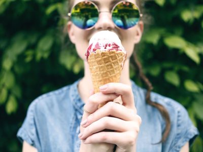 women enjoying an ice cream cone